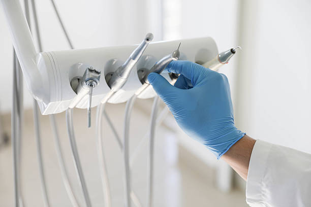 Professional Tooth Extraction technician working in Lake Royale, NC